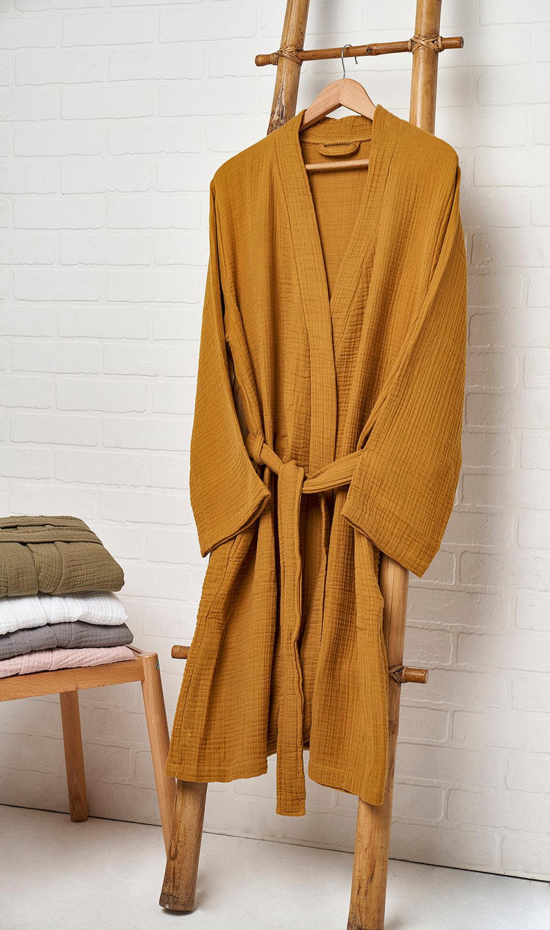 100% Turkish Cotton Extra Soft Muslin Fabric Unisex Bathrobes available in different colors and sizes  Product Details  Made up of four layers of natural muslin fabric, this product is extra soft, highly absorbent and durable.