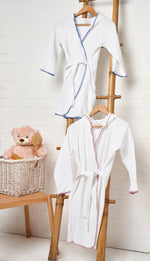 100% Turkish Cotton Kids Bathrobes with Hoodie and Belt  Available in different sizes and colors  Product Details  Crafted from the finest Turkish cotton, our hooded bathrobes are one of our most popular products. The pink blanket stitch detail give the bathrobes a pleasant vintage look. They are soft and lightweight and they dry quickly due to their 100% cotton fabric.